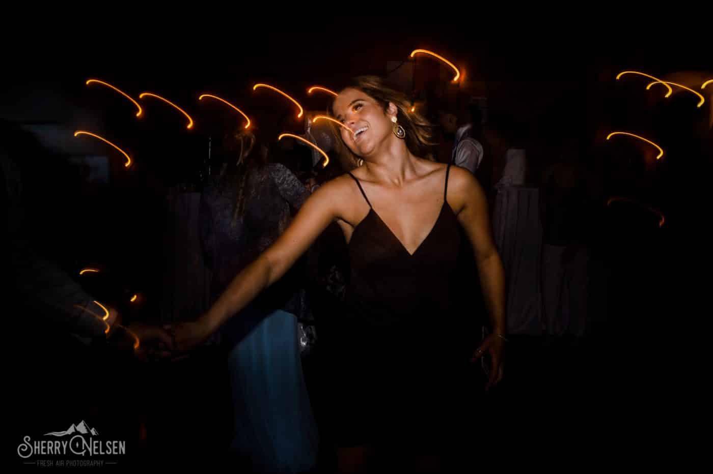 bride's cousin dances at this Sechelt Wedding