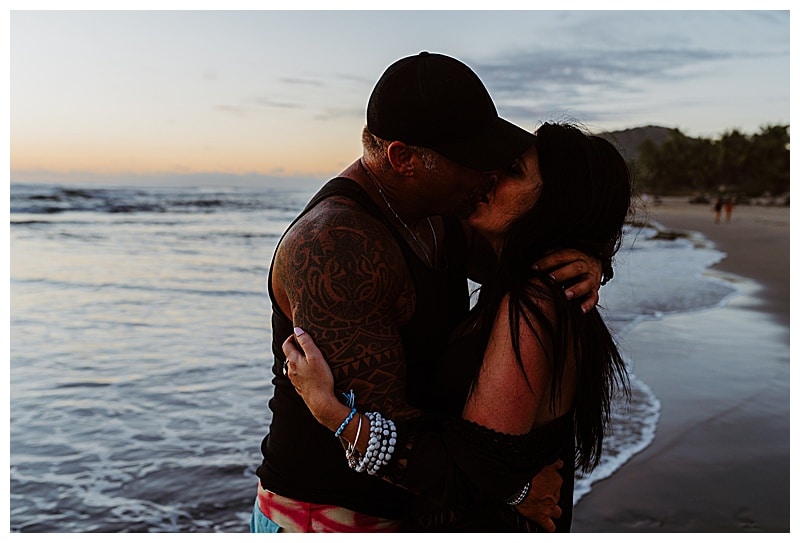 couple kissing on the beach at sunset in Troncones