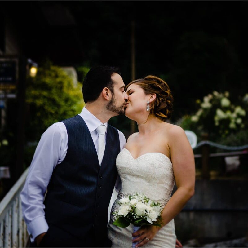 bride and groom kiss