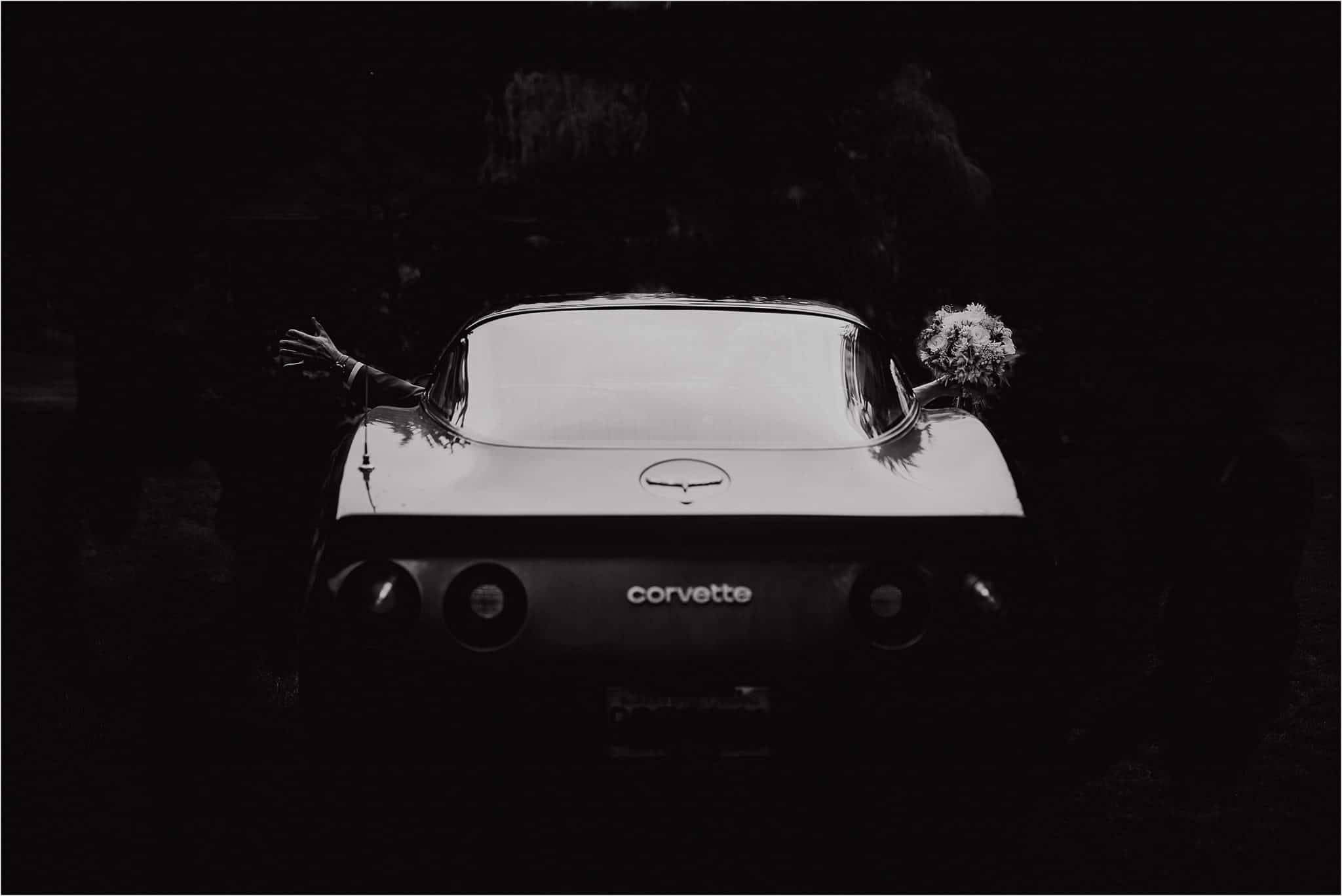bride and groom depart in his 81 corvette in Halfmoon Bay