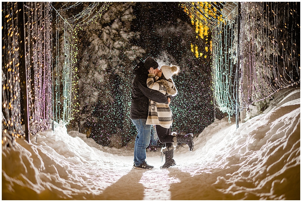 Newly engaged couple kiss in the Light Walk Tunnel on Grouse Mountain