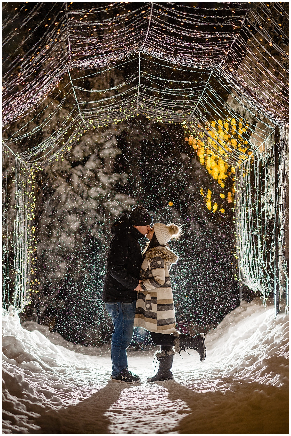 Newly Engaged couple kiss in the Light Walk Tunnel on Grouse Mountain