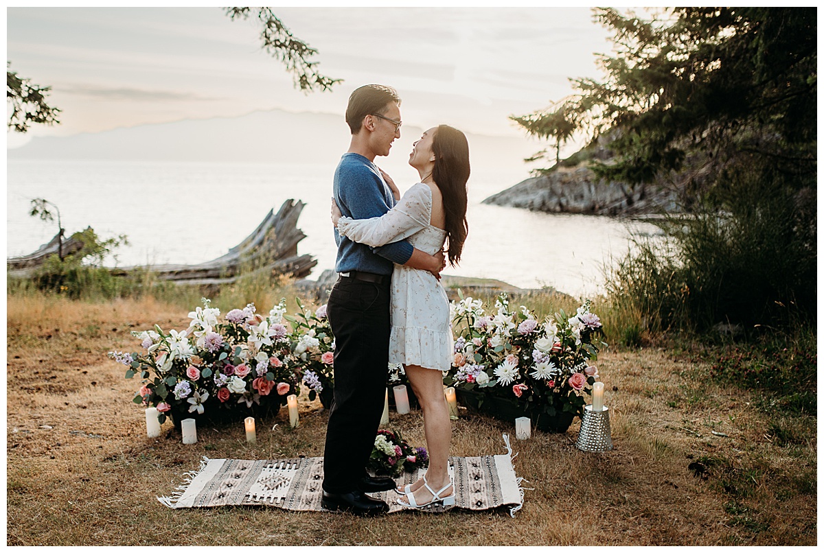 romantic oceanside proposal surrounded by flowers on the Sunshine Coast, BC
