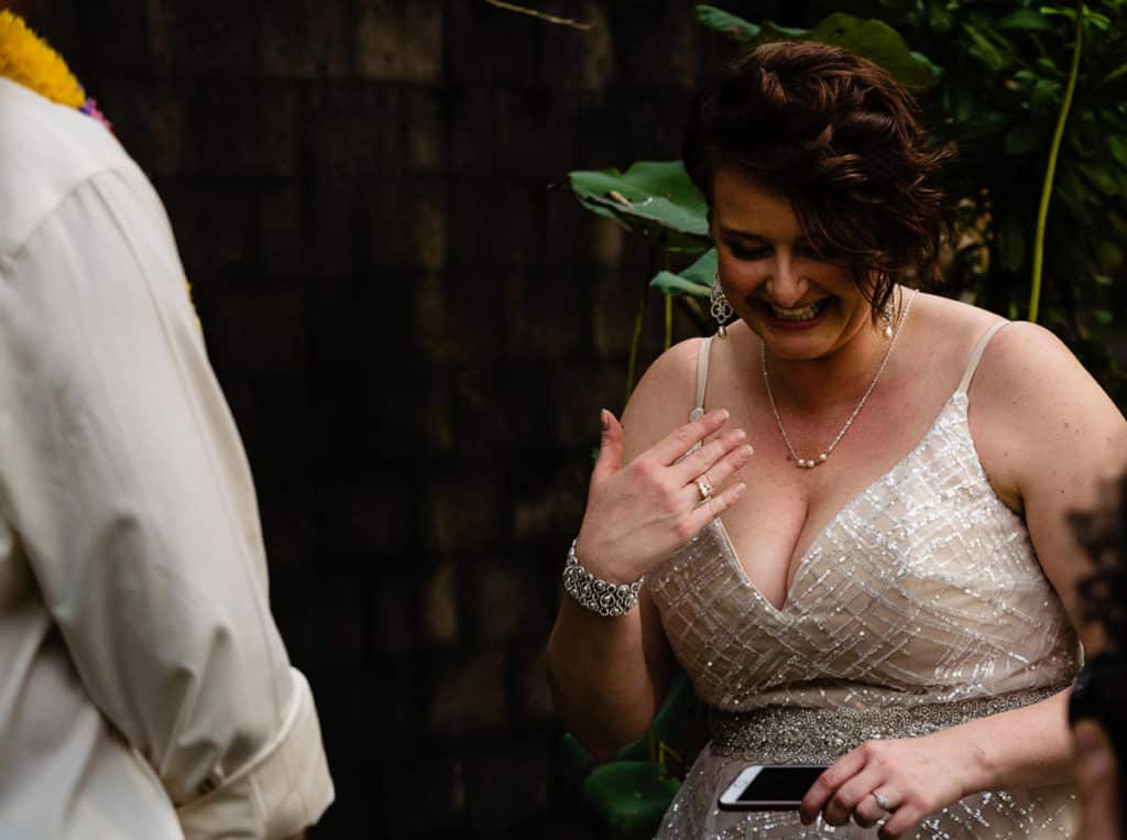 Bride laughs during vows in Bali
