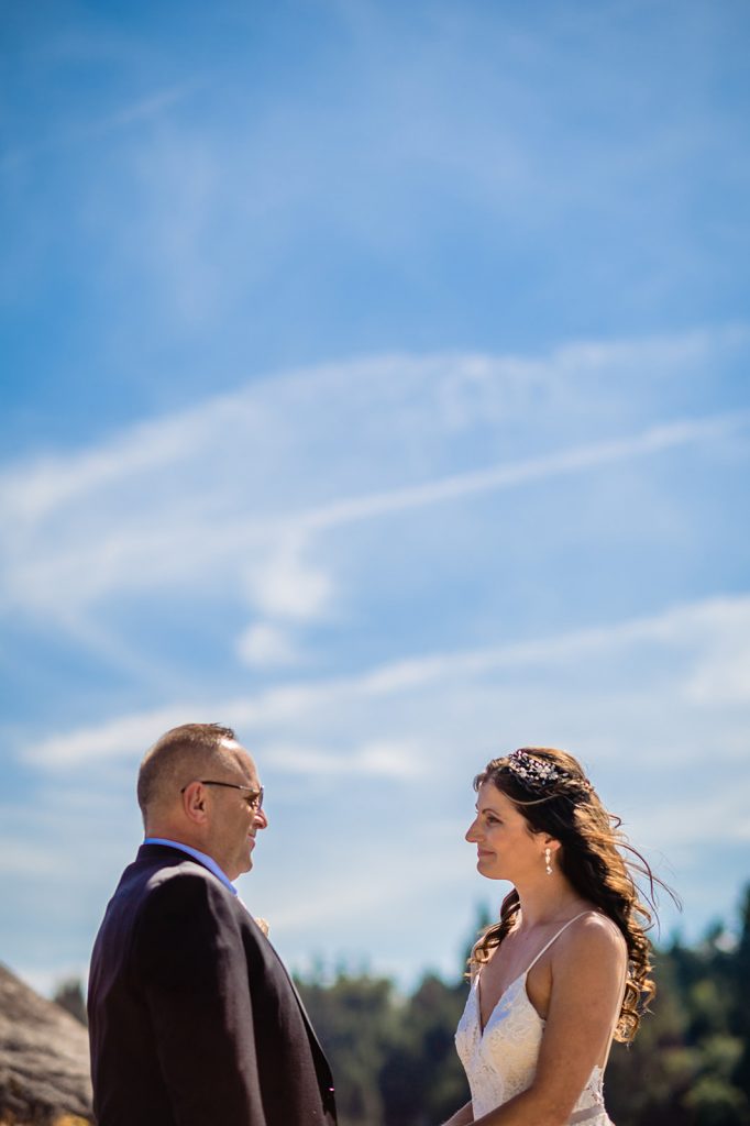 bride and groom and lovely blue skies