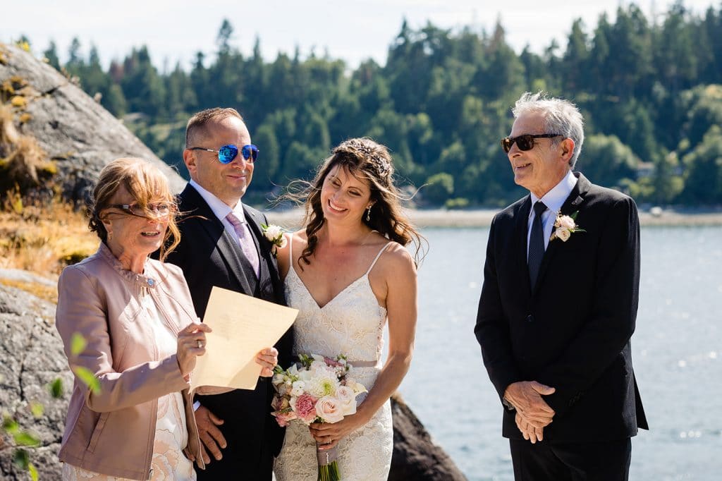father and mother of bride read speech during sunshine coast wedding