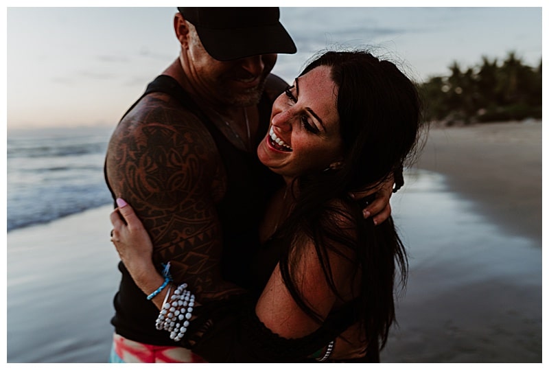 couple laughing in embrace