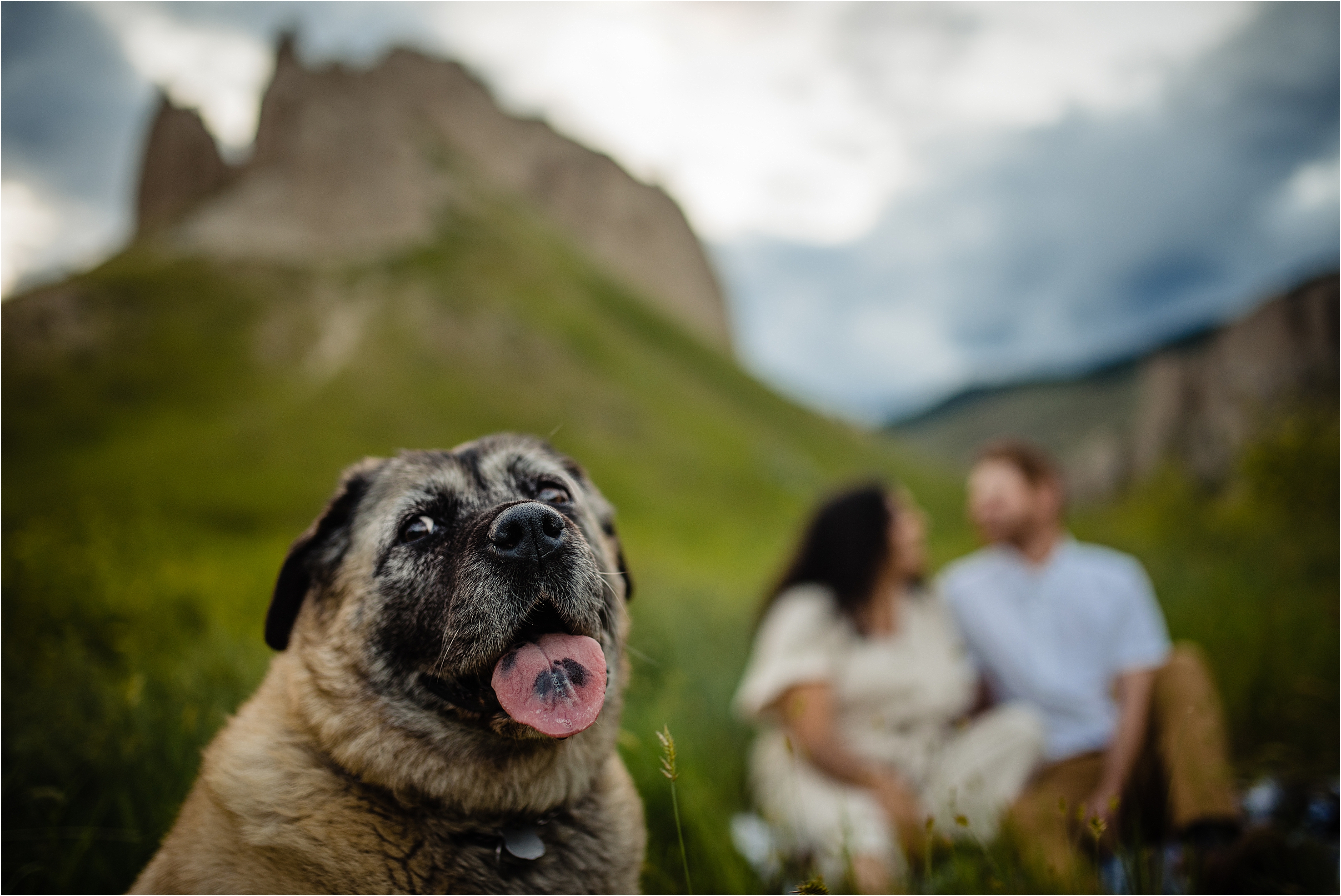 couple posing for engagement photos with their dog at hoodoos Kamloops 