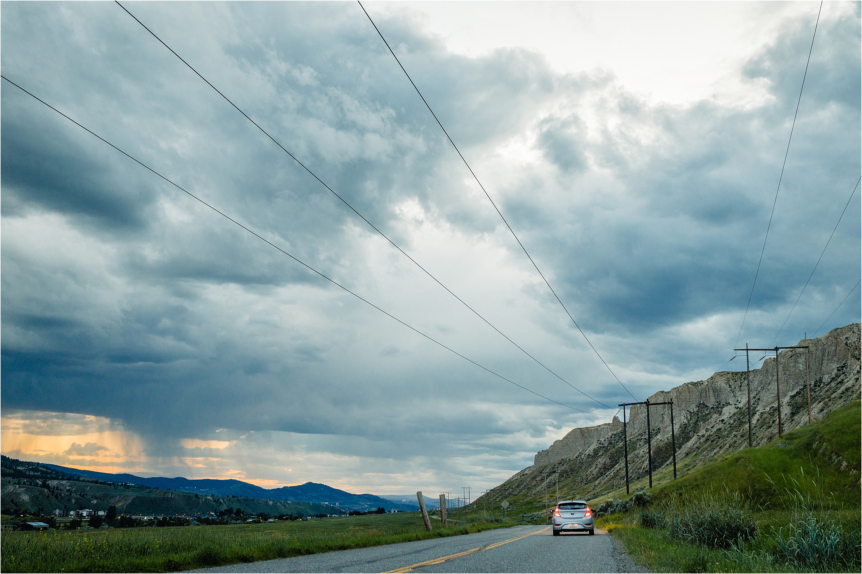 Moody clouds at hoodoos kamloops, couple leaving their engagment photo session