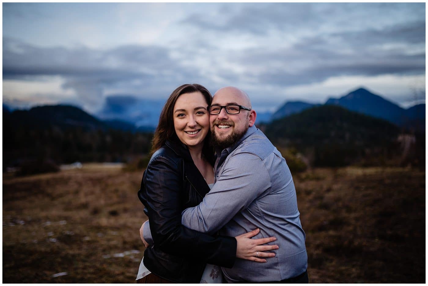 Couple smile for the camera at their Sunshine Coast engagement session