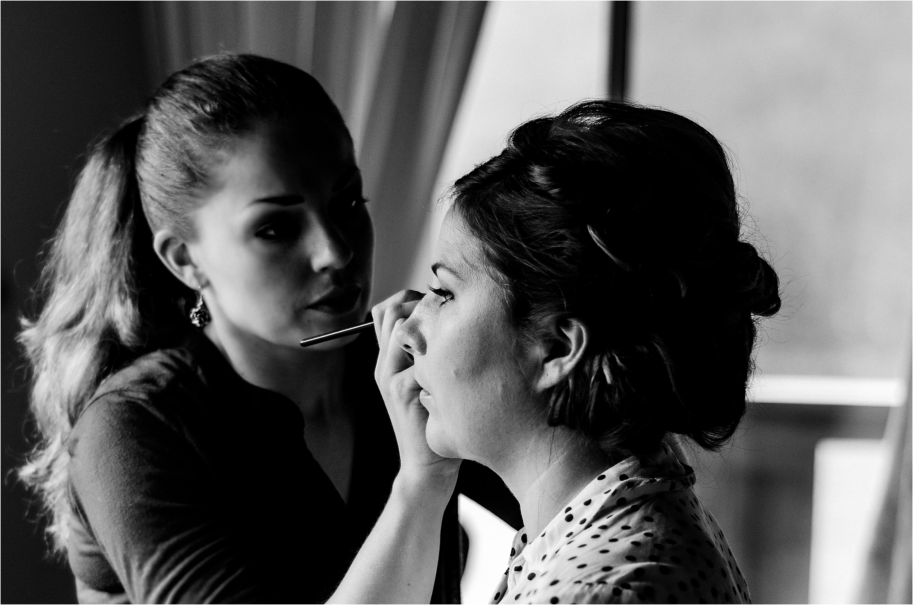 bride gets her makeup put on for her wedding day at West Coast Wilderness Lodge