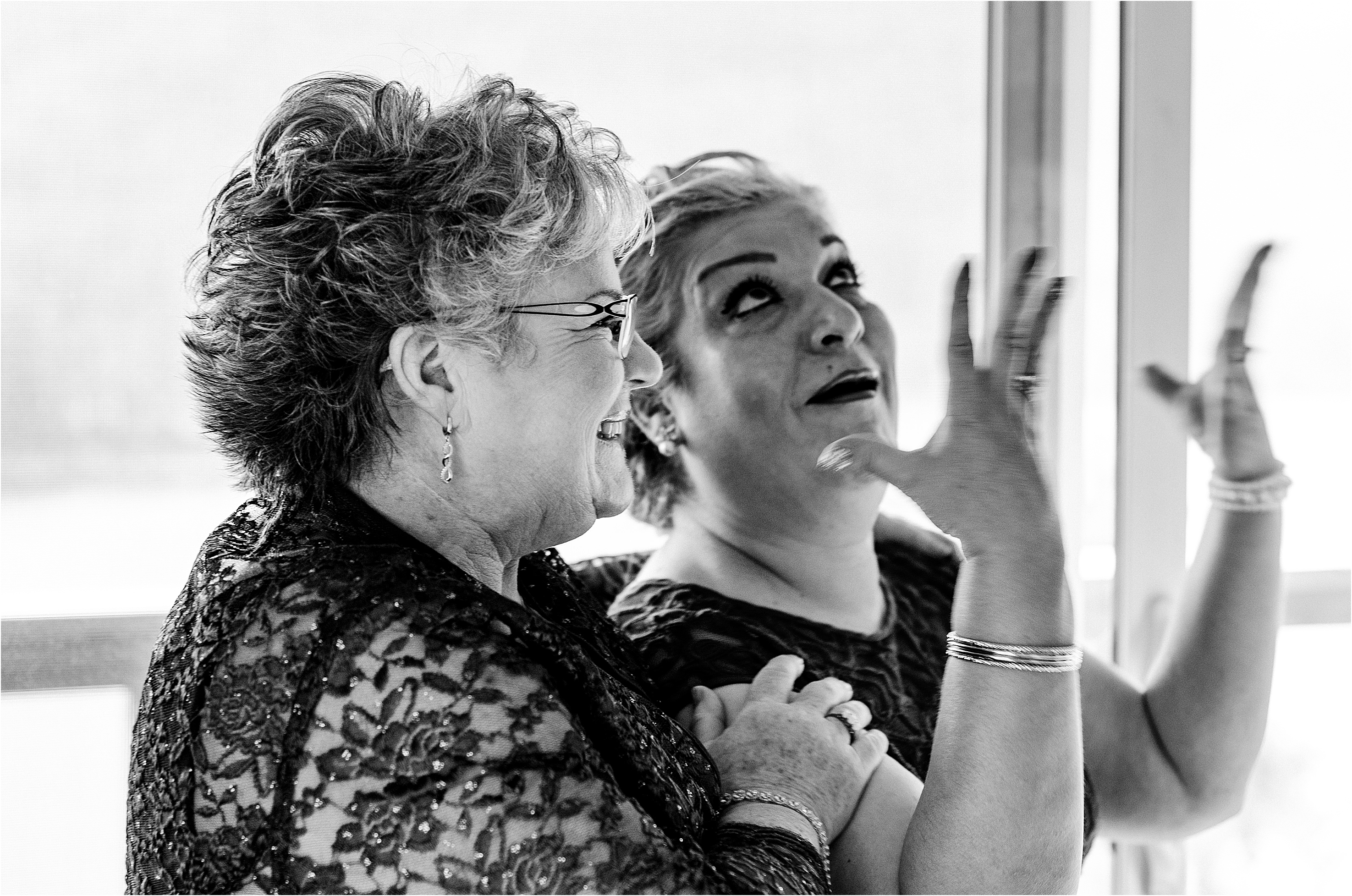 mothers of bride and groom rejoice when they see the bride