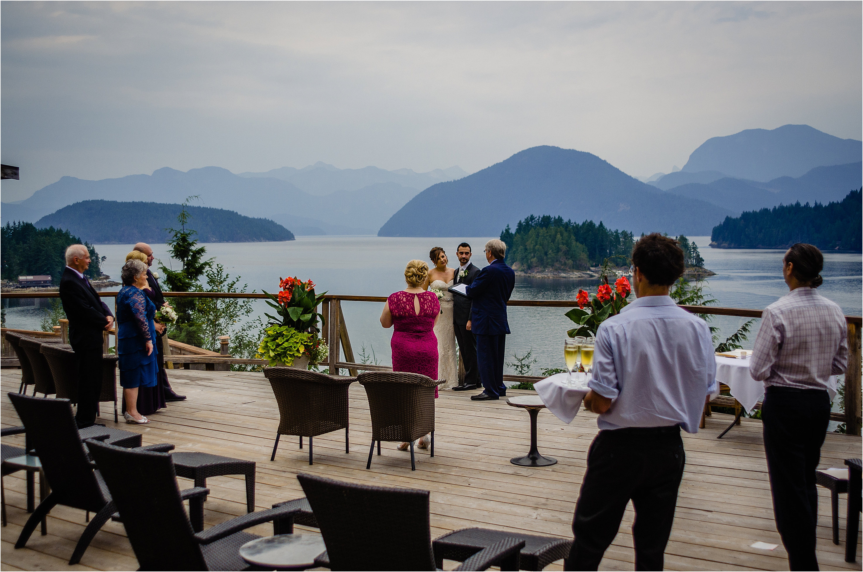 bride and groom, with family present marry at the West Coast Wilderness Lodge