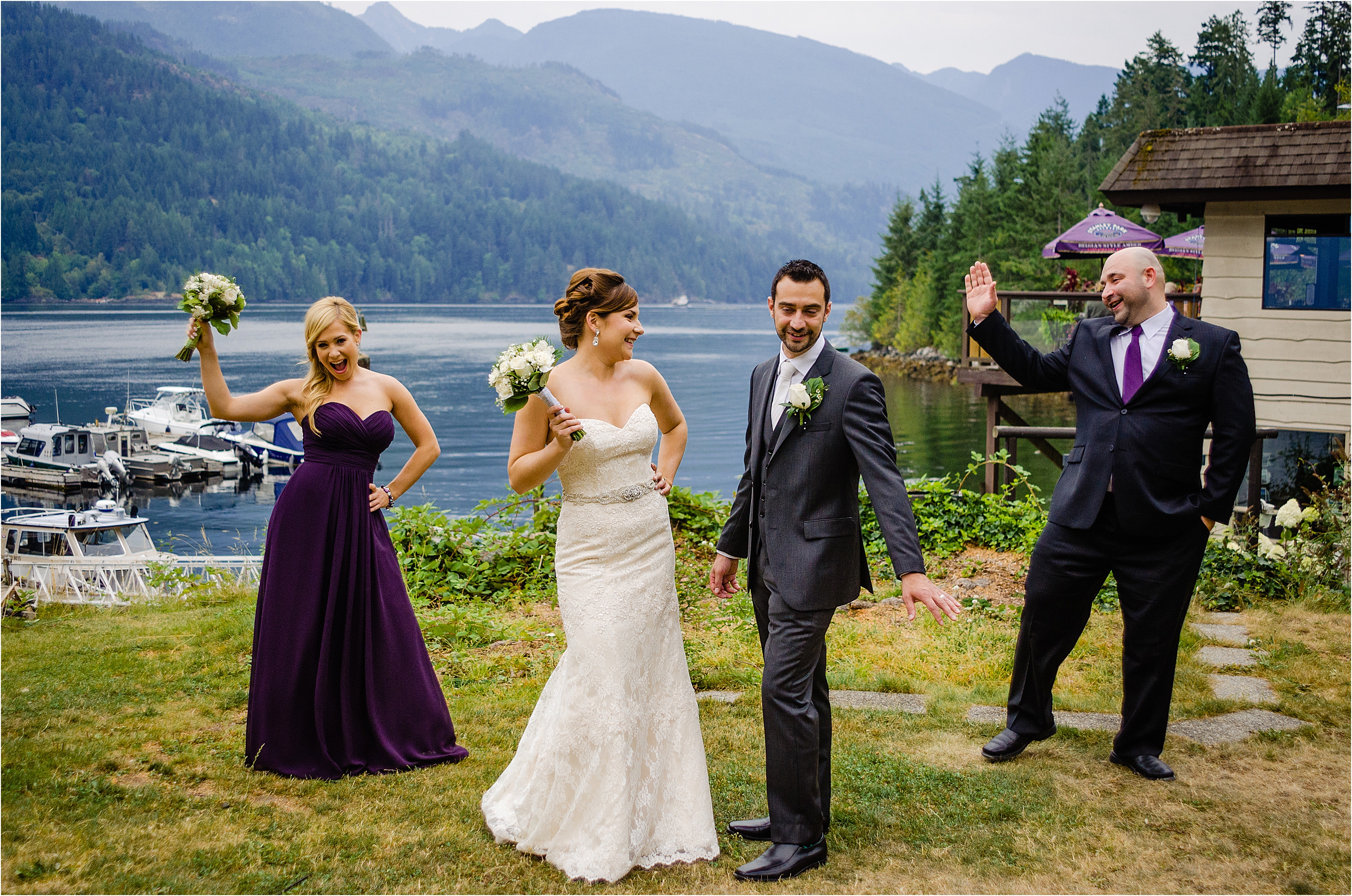 bride,groom, maid of honor and best man celebrate near the Back Eddy Pub