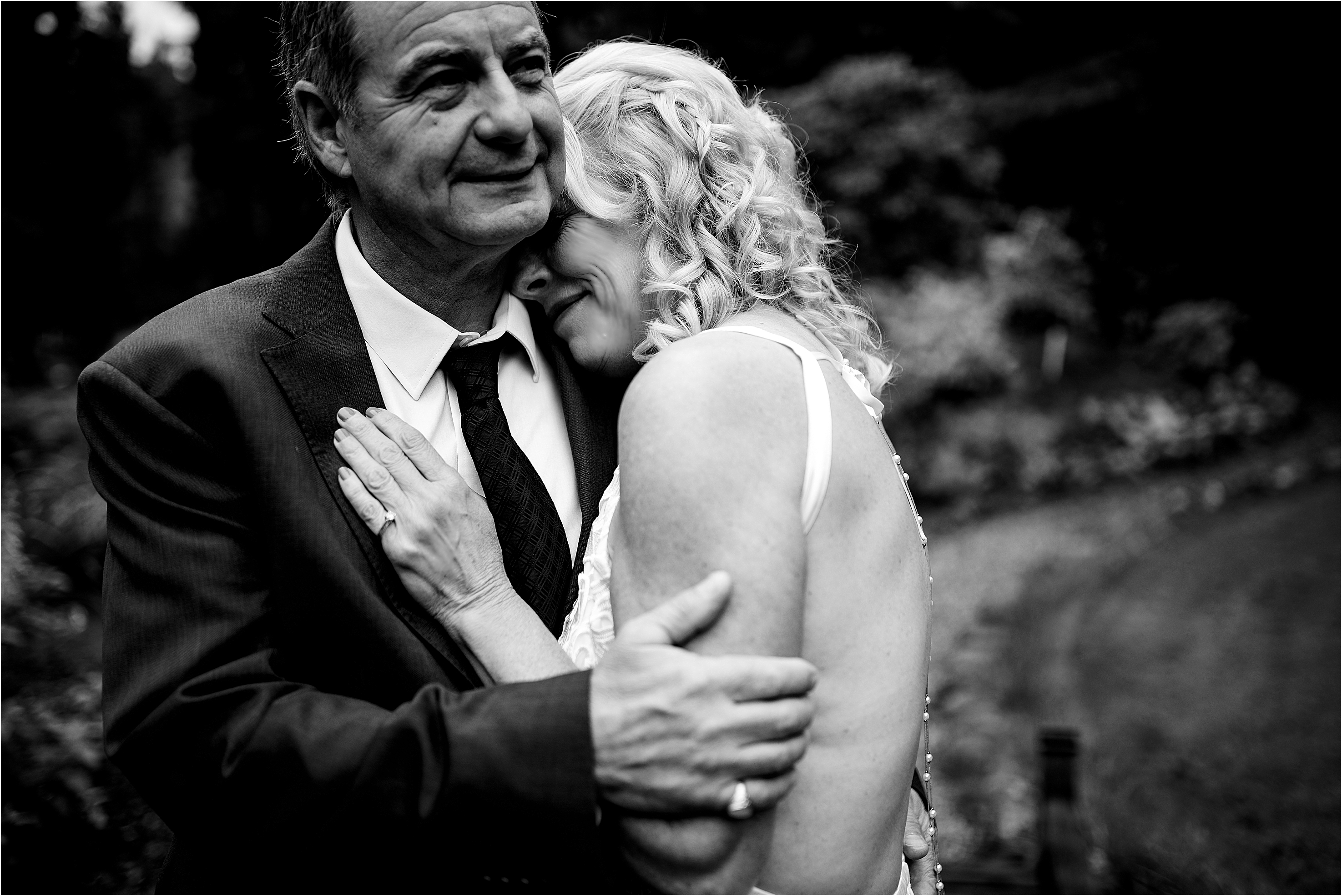 groom and bride embrace at Valhalla House Wedding