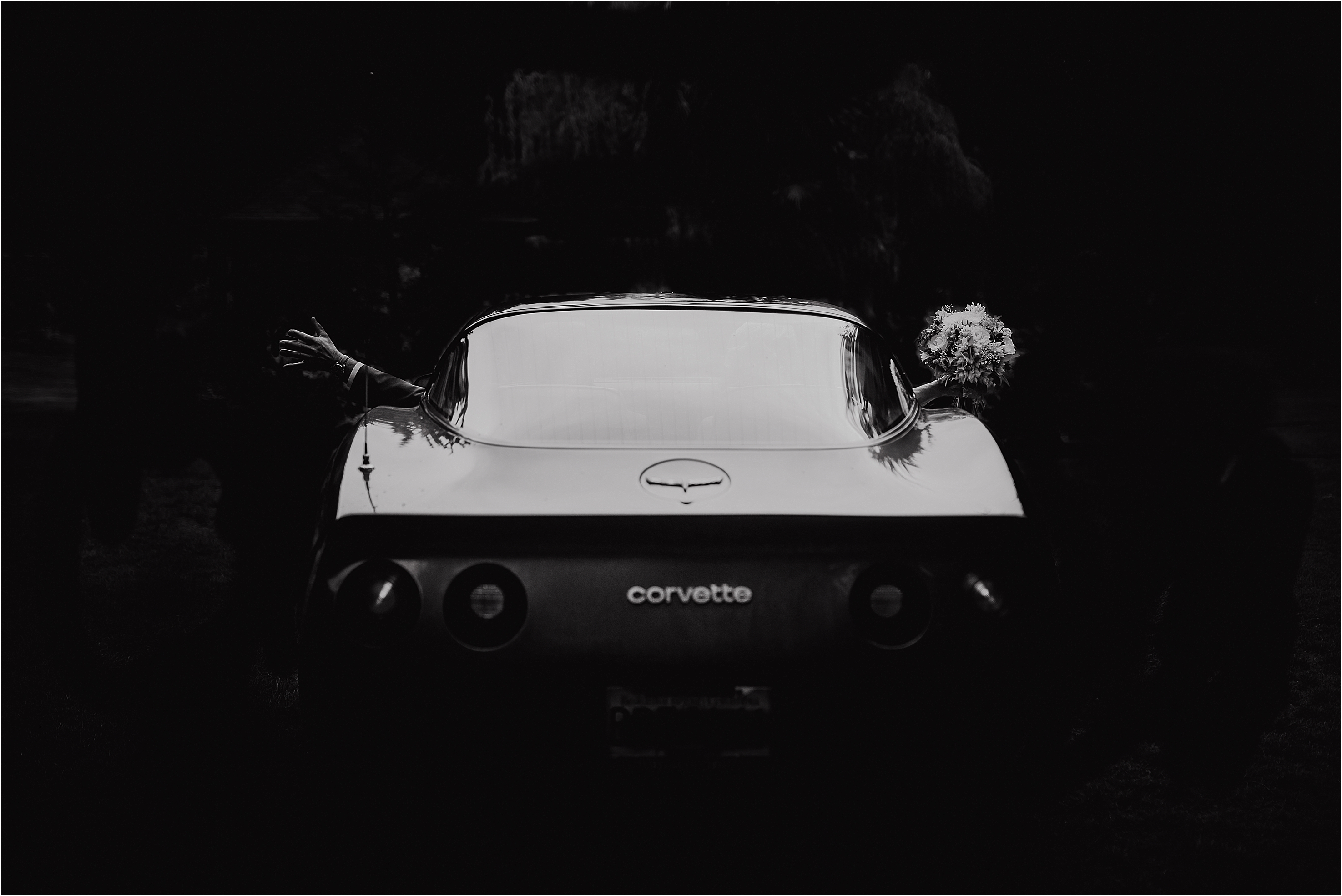 bride and groom depart in his 81 corvette in Halfmoon Bay