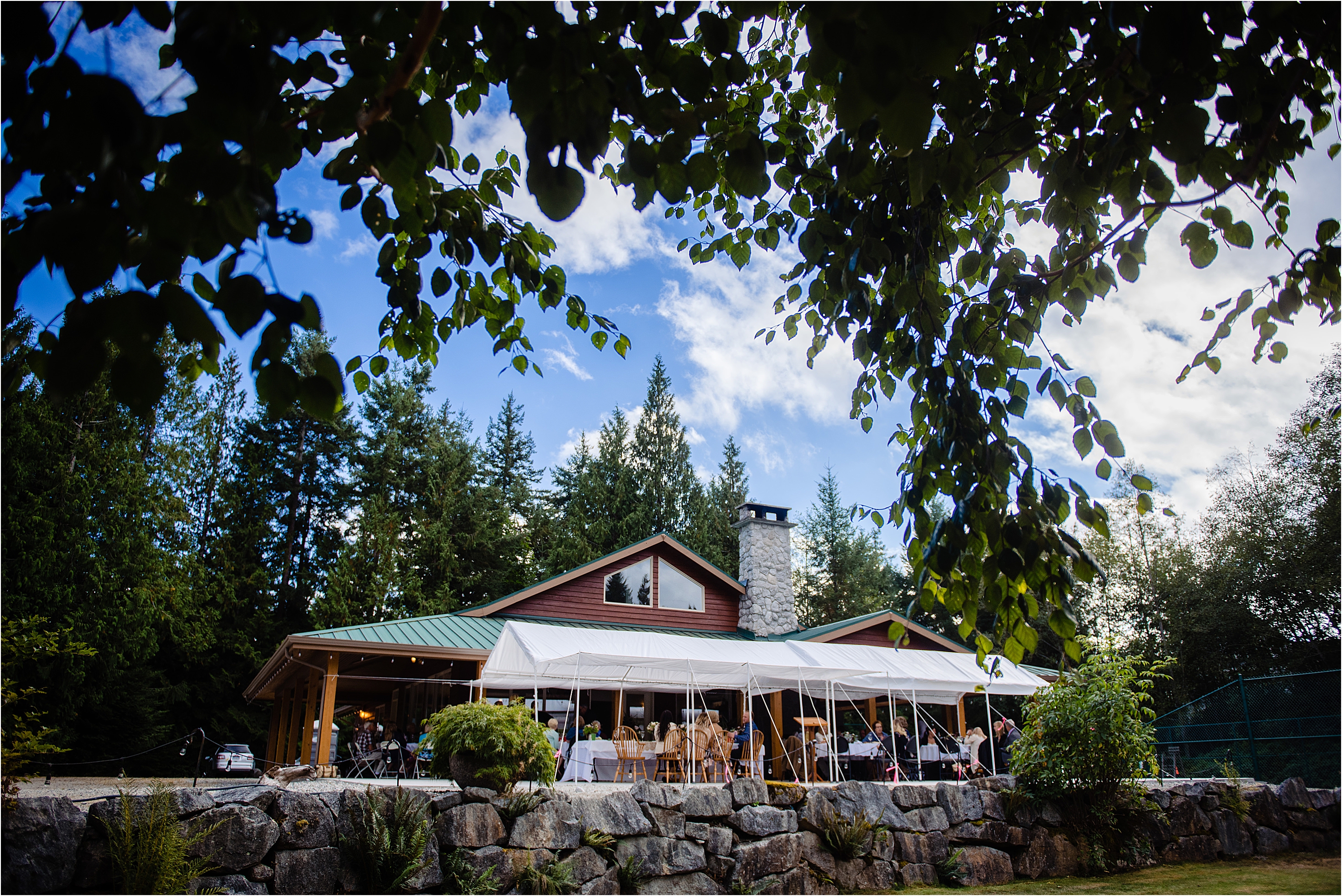 Valhalla House with people seated around for dinner